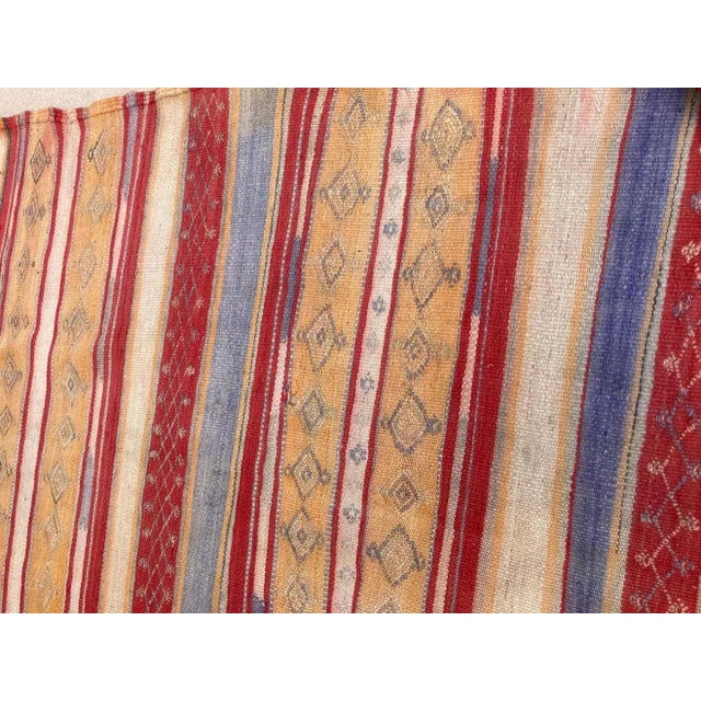 Large handwoven vintage Moroccan Berber Tribal Kilim rug, nicely aged with muted colors. Handwoven by the Berber tribes in...