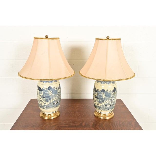 A gorgeous pair of vintage Chinoiserie ginger jar table lamps By Westwood Lamps USA, Circa 1970s Porcelain bases, with...