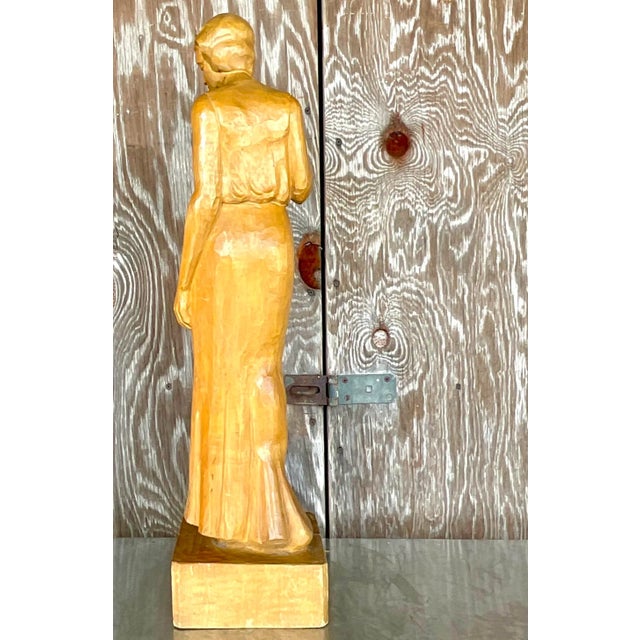 Add a touch of vintage elegance and artistic charm to your decor with this beautifully carved sculpture of a woman. This...