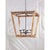 The Perennial birch wood lantern features a beautifully hand-carved outer frame that forms an open-air silhouette. An...