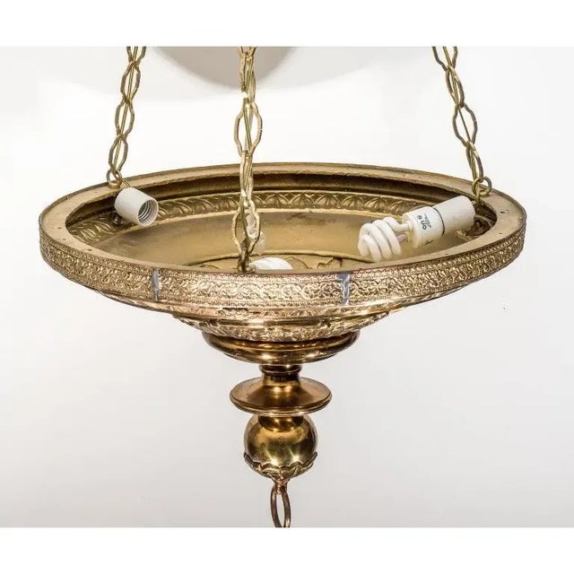 This stylish English Gothic Revival chandelier was purchased in London and it dates to the 1920s-1930s. Note: Height of...