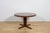 Round extendable table made of rosewood wood, manufactured in Denmark in the 1960s. The table is characterized by...
