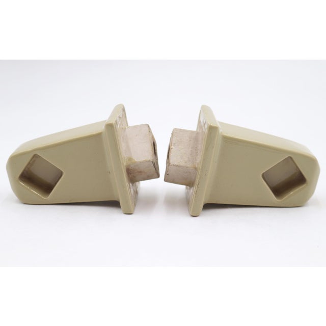 Reclaimed towel bar brackets made of muted green ceramic. It is compatible with a square bar with a 1.25 in. hole. Good...