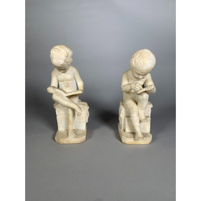 French Two 19th Century Marble Sculptures: The Child Scribe and The Reader, After Lemire For Sale - Image 3 of 11