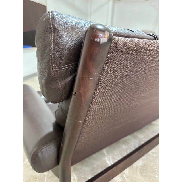 Vintage 1970’s Scandinavian Loveseat styled after the Inca by Arne Norell. Outfitted in the original dark brown leather on...