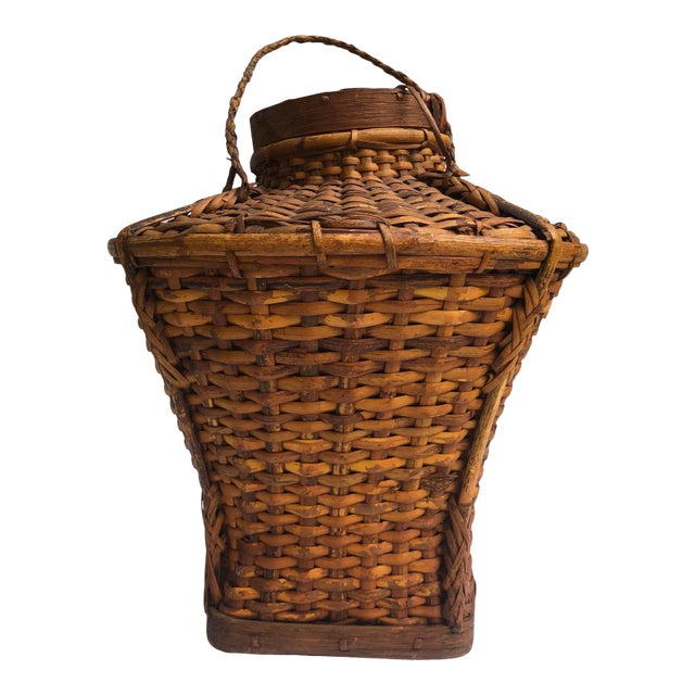 Early 20th Century Urn-Shaped Rattan Basket With Attached Herringbone Pattern Lid and Cane Strap Handle For Sale
