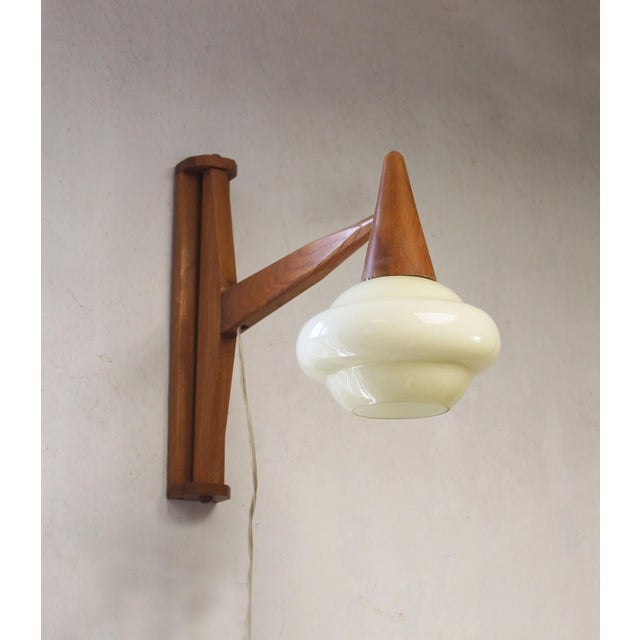 A beautifully proportioned Mid-Century wall light dating from the 1960s and believed to have been produced in former...