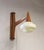 A beautifully proportioned Mid-Century wall light dating from the 1960s and believed to have been produced in former...