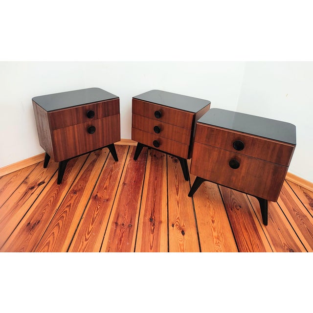 Bedside table designed by J. Halabala for Up Zavoda, Czechoslovakia, 1950s. Elegant nightstands are a combination of...