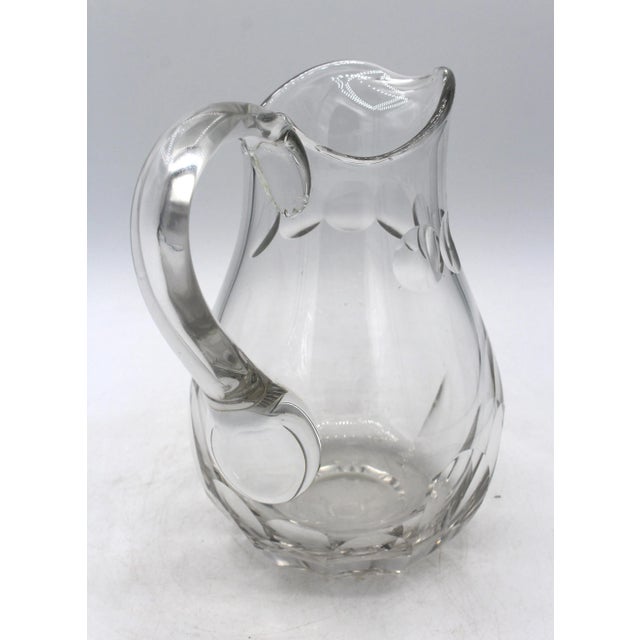 Circa 1930 lobe panel cut water pitcher, Continental. Circle cut neck panel & applied handle. From a Milanese wedding....