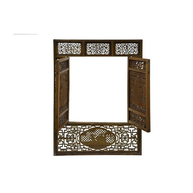 Elevate your interior space with this exquisite antique Chinese wooden window panel frame, a masterclass in traditional...