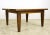 This handmade coffee table is made of walnut with tapered legs. This piece was handcrafted in our table shop located in...
