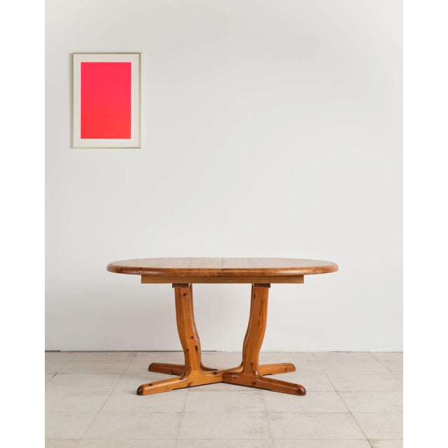 An exceptional brutalist dining table made of solid pine, attributed to rainer daumiller and crafted in denmark....