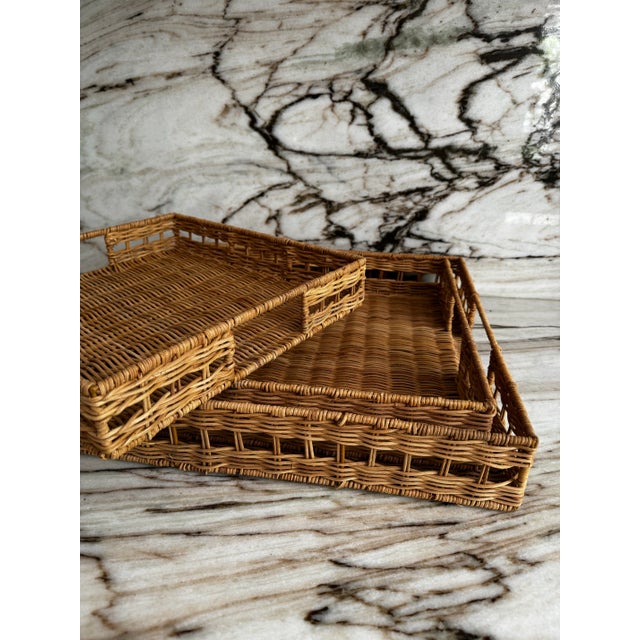 Set of three natural wicker beautifully handmade and woven in Vietnam, nesting trays. They are ideal for coffee table...