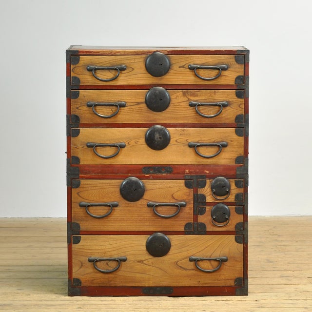 Traditional Japanese Tansu chest of drawers from the 1870s. Manufactured during the late Meiji era (1868-1912). This piece...