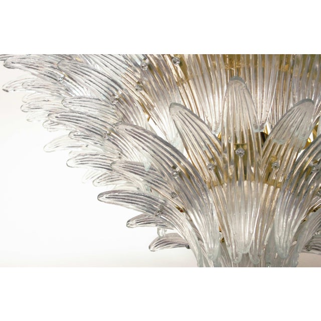 Italian Palmette chandelier with clear Murano glass leaves mounted on gold finish metal frame / Made in Italy by Fabio Ltd...