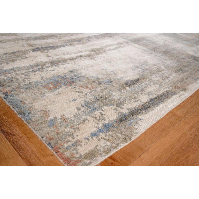 Our Laureno rug is hand knotted of Bamboo silk and is the absolute definition of “Art for the Floor.” A borderless...
