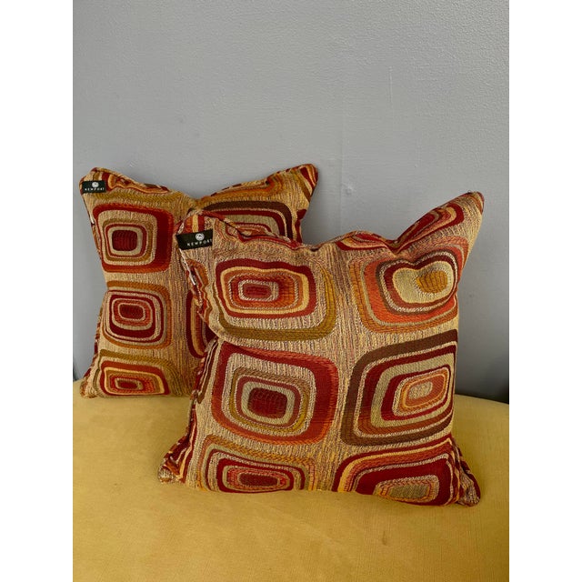 Elevate any seating area with this pair of Newport decorative throw pillows, showcasing a rich Art Deco–inspired geometric...