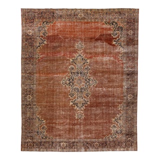 Persian Handmade Antique Tabriz Medallion Wool Rug With Copper Color Field For Sale