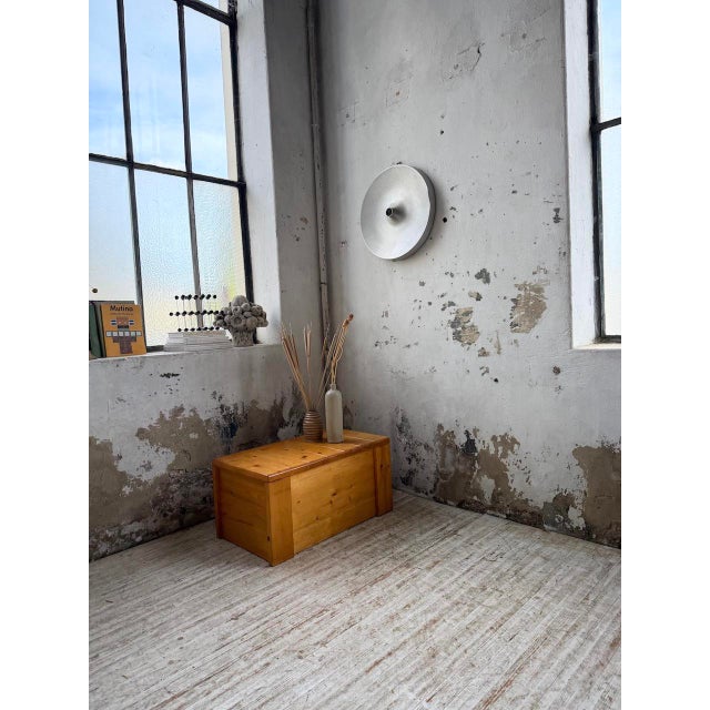 Antique pine chest that can also be used as a coffee table, selected by perriand for the les arcs 1800 resort. Typical of...