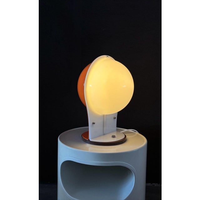 Space Age sphere table lamp, 1970s Made in the seventies in Italy, unknown designer but attributed to Guzzini. There is no...