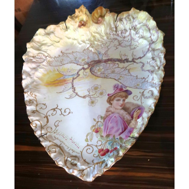 This is a truly extraordinarily beautiful large English antique porcelain work of art. The heart-shaped form and lovely...