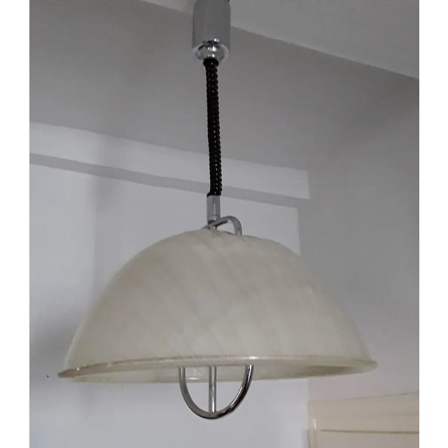 Adjustable Double Flame Ceiling Lamp with Chrome Metal Mount, 1970s, in Good conditions. Designed 1970 to 1979 European...