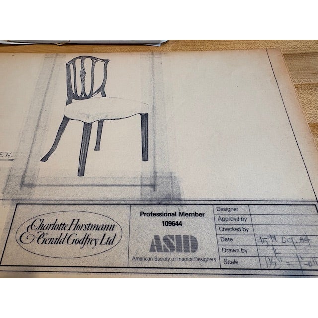 George Hepplewhite inspired solid rosewood dining room side chairs with shield-shaped backs and simple straight tapering...