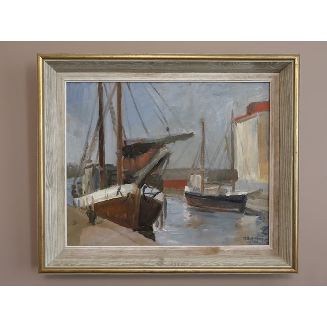 HARBOUR AT REST Size: 21.1 x 24.8 inches (including frame) Oil on canvas An atmospheric mid-century seascape that captures...