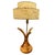 Restored pair of three-strand scalloped rattan bent pole table lamps on a mahogany base with brass center rob and...
