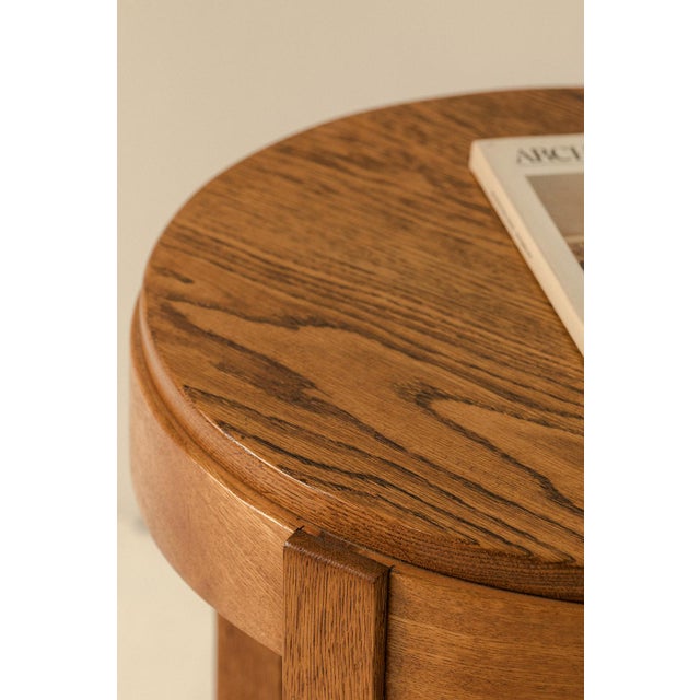 2 tone art deco side table produced in the Netherlands around 1930. Elegant side table in solid oak, finished with wengé...
