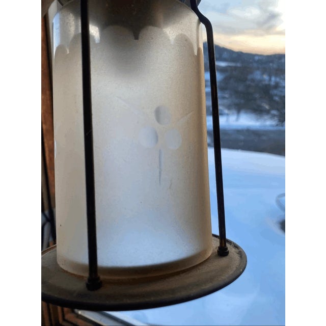 10" tall 4.6" wide Good condition This piece features a beautiful contrast between its rugged, industrial metal frame and...