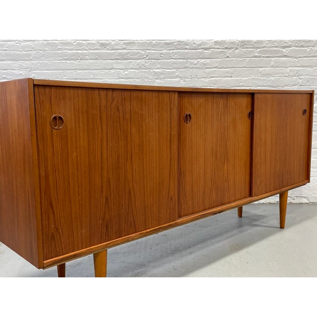 Long Mid Century Modern Teak Credenza | Danish Sliding Door Sideboard, C. 1960's For Sale - Image 11 of 15