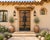 Antique Chinese Pine Compound Gate, of monumental proportions featuring iron strapping with nailheads and a very...