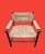 This Midcentury modern lounge chair is designed in the style of Mel Smilow or Charlotte Perriand. Featuring a dark wood...
