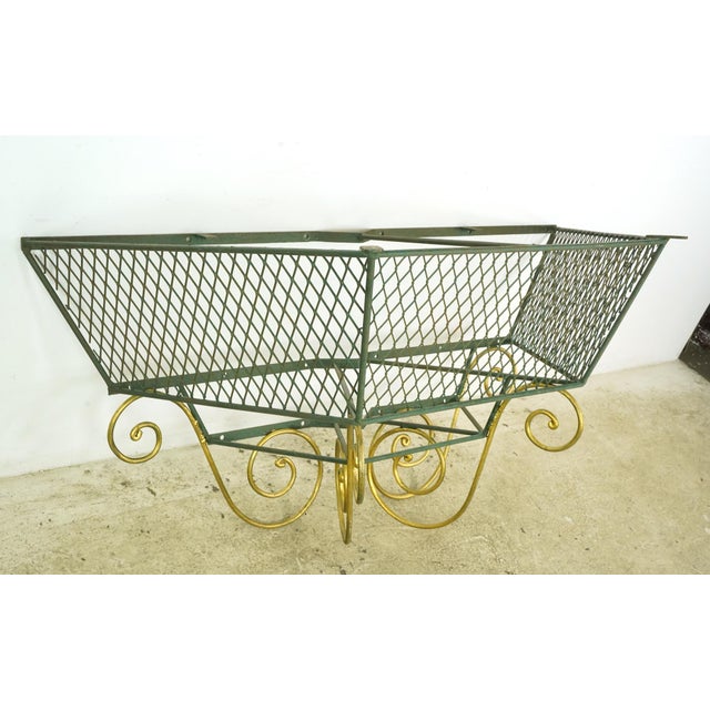 French style console table base made of wrought iron, painted green and gold. The base can be attached to the wall for...