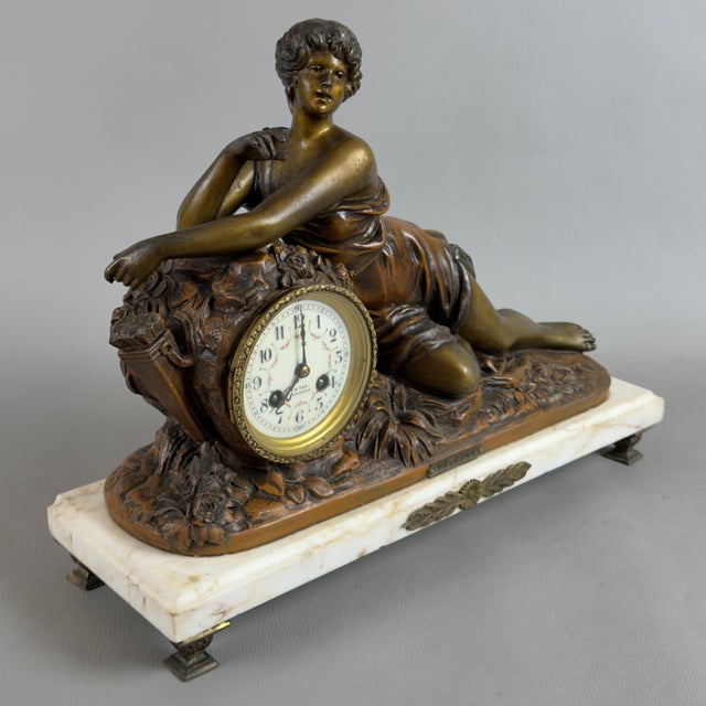 A sculptural French clock from the late 19th century, depicting the allegorical figure "Rêveuse" (signed by the artist)....