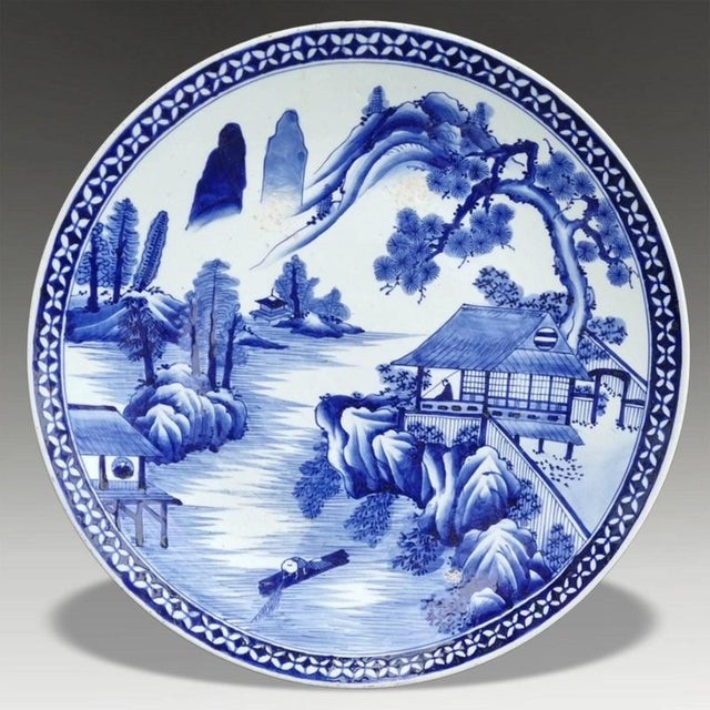 A substantial Japanese Arita porcelain charger bearing Yamatoku decoration and dating to the Meiji period. The piece...