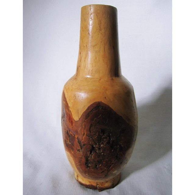 Gorgeous hand turned Vase with Bowl stand. The vase measures 12"H x 5"D and the bowl/stand measures 7.5"D x 3"D. The...
