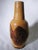 Gorgeous hand turned Vase with Bowl stand. The vase measures 12"H x 5"D and the bowl/stand measures 7.5"D x 3"D. The...