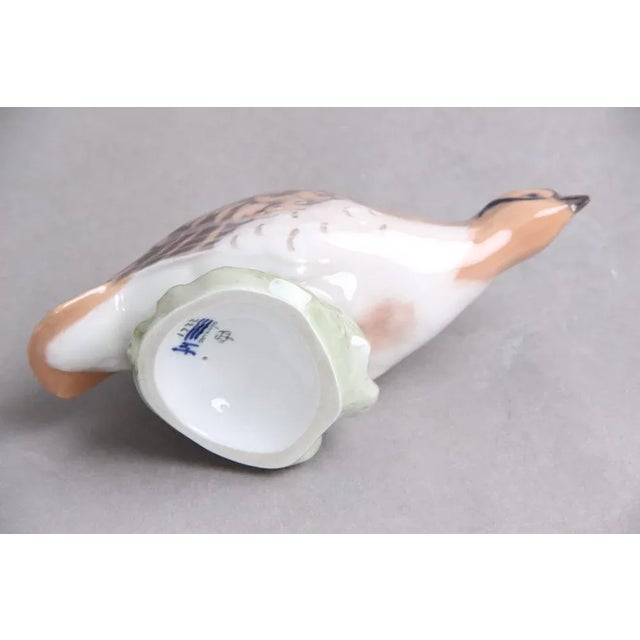 Partridge figurine model 2261 made of hand-painted porcelain with underglaze. Designed by Peter Herold for Royal...