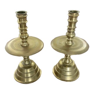18th Century Dutch Brass Candlesticks With Mid Mounted Drip Trays - A Pair For Sale