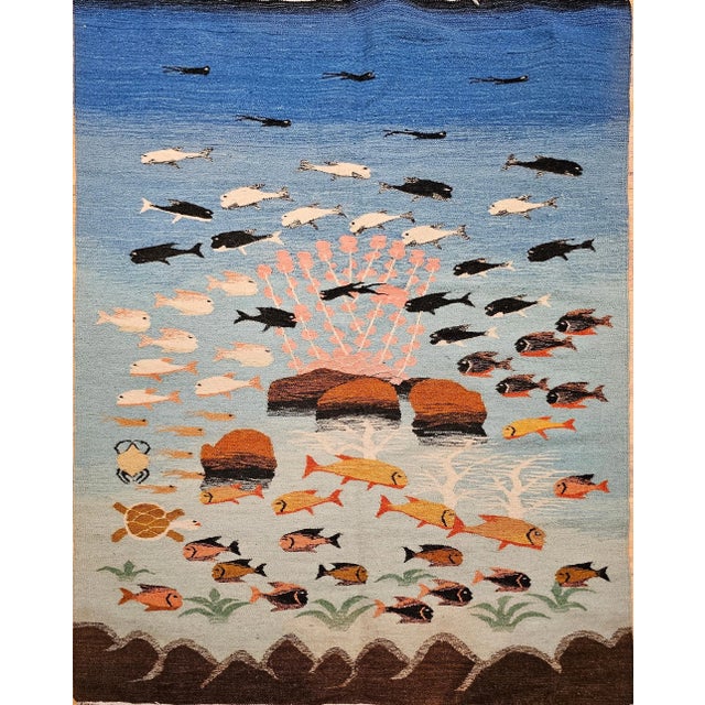 Beautiful hand woven mid century modern flat woven kilim rug depicting an underwater ocean scene. The hand woven piece is...