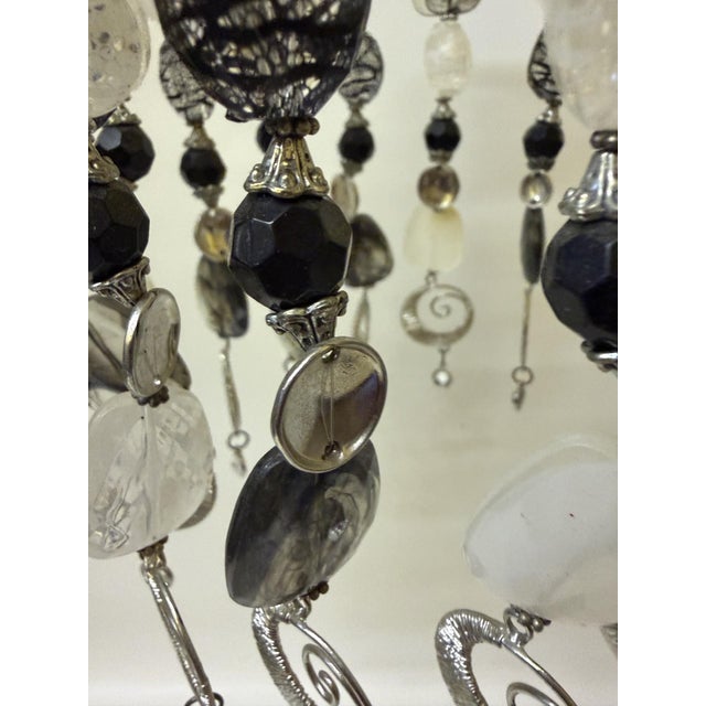 Elevate your interior space with this stunning, one-of-a-kind hanging art mobile sculpture. Hand-assembled by an...