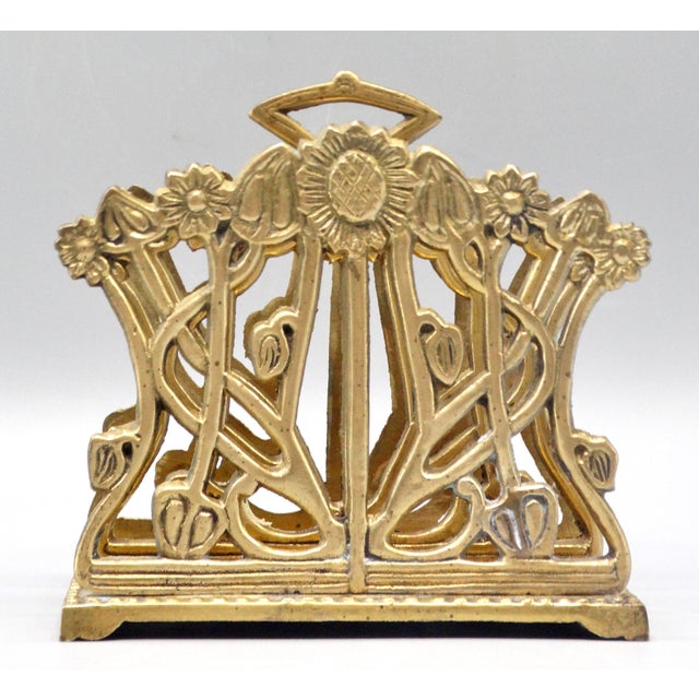 Nice quality early 20th-Century solid brass Art Nouveau letter rack. The lovely, long sinewy lines of the sunflowers...