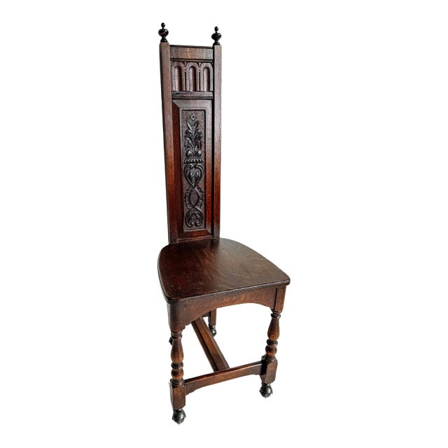 Vintage Gothic Revival Oak Hall Chair With Carved Back and Casters For Sale