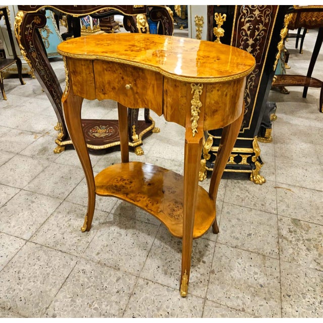 Add timeless French elegance to your home with this exquisite Louis XV style side table, beautifully crafted in richly...