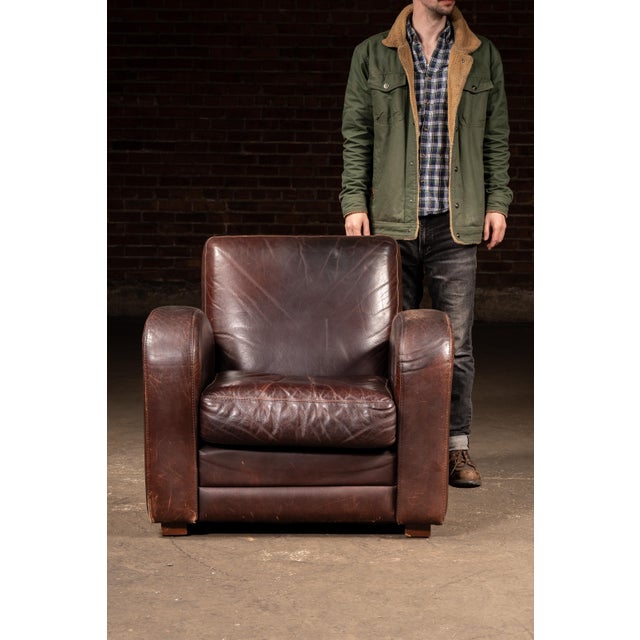 c. 1980s/1990s; Legacy Leather International Inc. - Concord, Ontario Substantial leather club chair paired with a matching...