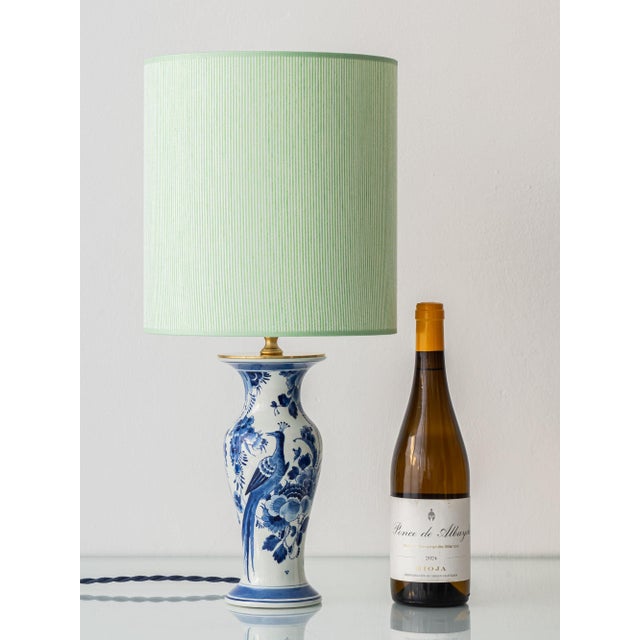 Pair of Royal Delft blue and white hand-painted Chinoiserie table lamps from De Porceleyne Fles— the Netherlands' oldest...