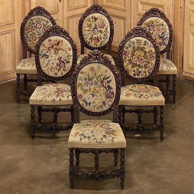 Set of Six 19th Century French Louis XVI Carved Dining Chairs with Original Needlepoint are amazing works of the...